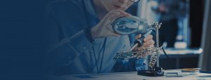 engineer using magnifying glass